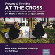 PRAYING AT THE CROSS