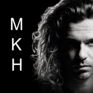 M K H