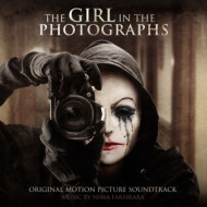 GIRL IN THE PHOTOGRAPHS